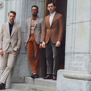 3 mens wearing different menswear clothing in New York