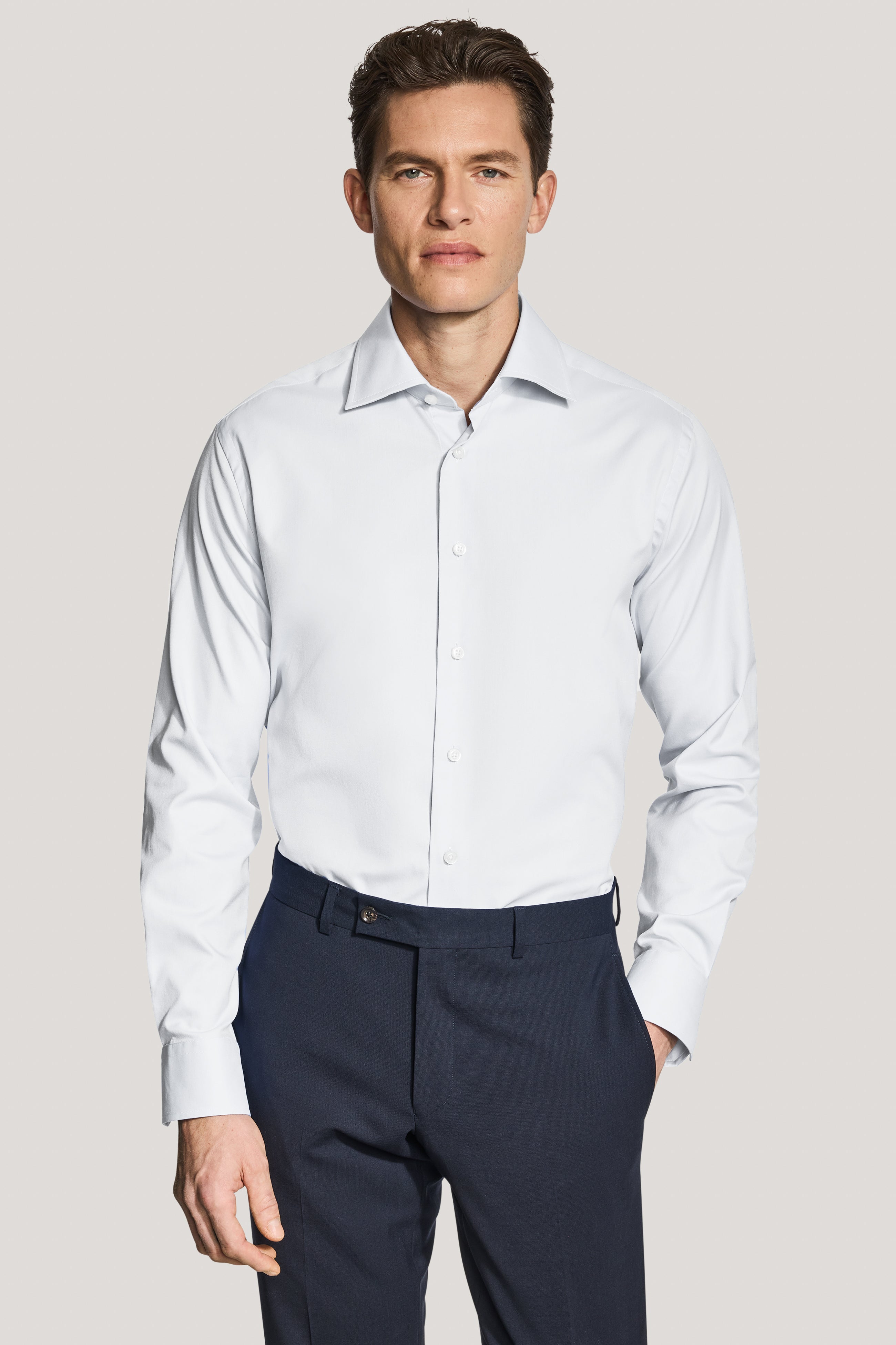 a dress shirt Men's Traveler Collection Tailored Fit Spread Collar Solid Dress Shirt at Jos. A. Bank, Cream/White, Size 16 1/2 X 34