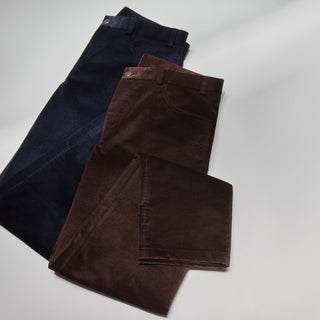 Two Jack Victor trousers folded side by side. Dark blue and brown