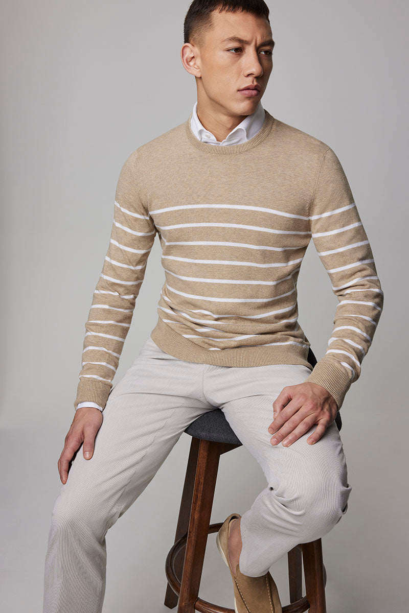 Jack Victor Launches E-commerce with a new sportswear collection featuring the Cedar striped organic cotton sweater