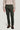 Pine green stretch chino pants with a straight leg fit, shown worn with a beige sweater.