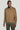 Tan Harrington jacket with spread collar, front zip closure, and patch pockets worn over olive pants.