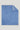 Blue twill throw blanket with fringe trim on all edges and a small label patch in corner.