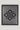 Black and gray throw blanket with geometric diamond monogram pattern and fringe edges.