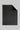 Charcoal gray blanket with chevron quilted pattern, black binding edge, and monogram detail in lower right corner.