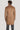 Camel wool coat with double-breasted front closure and button details, shown from back view on model.