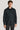 Dark green wool shirt jacket with front button closure and two chest pockets.