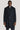 Navy twill topcoat with two-tone construction, notched lapels, button front closure, and removable bib insert.