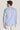 Men's long-sleeve button-up shirt with blue and white vertical stripes, shown from back view.