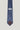 Indigo tie with light blue geometric squares and diamonds, brown tip, Jack Victor label.
