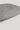 Gray ribbed knit beanie with vertical texture detail shown against a neutral background.