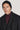 Black knit beanie worn by man with dark coat and burgundy sweater against neutral background.