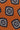 Terracotta tie with navy and cream geometric square medallion pattern throughout.