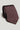 Burgundy tie with repeating geometric diamond pattern in cream and black stripes.