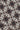 Ecru tie fabric with brown and black geometric floral medallion pattern.