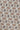 Cream-colored tie fabric with repeating brown and charcoal geometric diamond pattern.