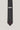 Black tie with herringbone pattern and dark solid tip, Jack Victor brand label visible.