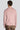 Pink crewneck sweatshirt with ribbed knit texture, shown from back on male model.