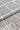 Grey and cream houndstooth patterned scarf with fringed edges.