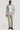 Light grey plaid blazer with notch lapels and button front, styled with white dress shirt and beige trousers.