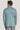 Man wearing teal melange single-breasted blazer with notch lapels, shown from back view.